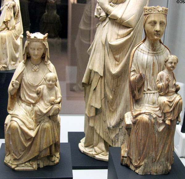 Ivory carvings of Enthroned Virgin & Child (c1250 & c1220) from Paris & Northern France at Cluny Museum. Paris, France.