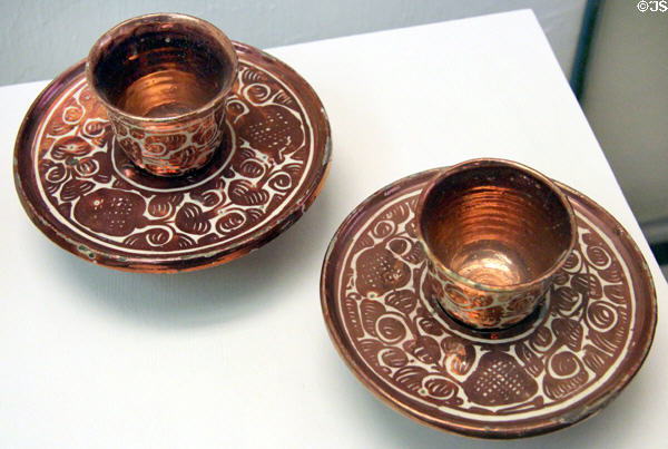 Ceramic cups & saucers with metallic decoration (18thC) from Spain at Cluny Museum. Paris, France.