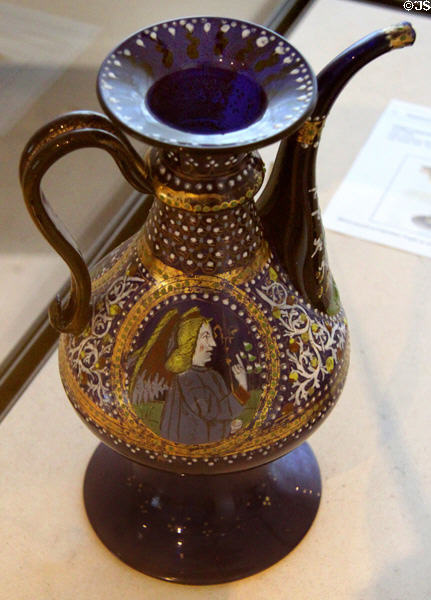 Glass water pitcher painted with Annunciation angel (c1500) from Venice at Petit Palace Museum. Paris, France.