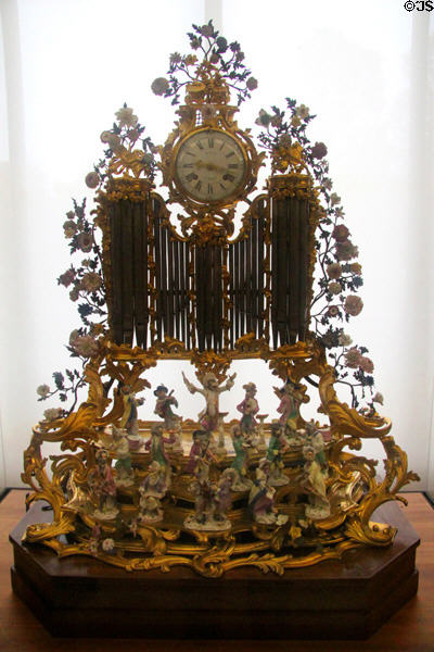 Clock (18thC) by Jean Moisy holding Meissen Concert of Apes figures (c1750s) at Petit Palace Museum. Paris, France.