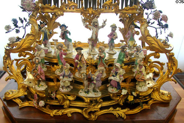 Meissen Orchestra Apes on platform base of baroque clock at Petit Palace Museum. Paris, France.