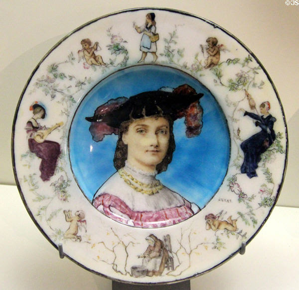 Ceramic plate (1870-5) showing young woman in dress of 16thC by Albert Anker with Théodore Deck from Sèvres at Petit Palace Museum. Paris, France.