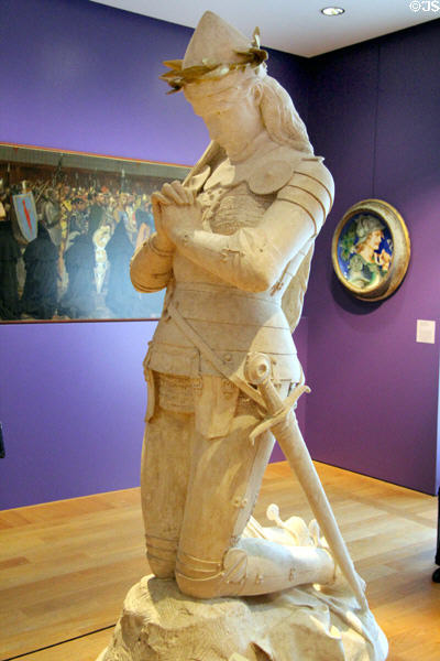 Praying Joan of Arc sculpture plaster model (1875) by Emmanuel Frémiet at Petit Palace Museum. Paris, France.