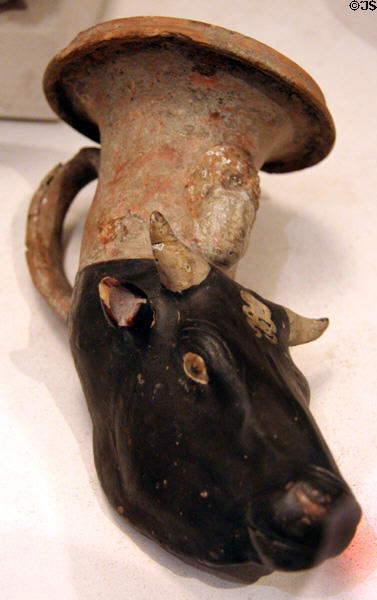 Rhyton in form of head of cow (c350-330 BCE) from Taranto at Petit Palace Museum. Paris, France.