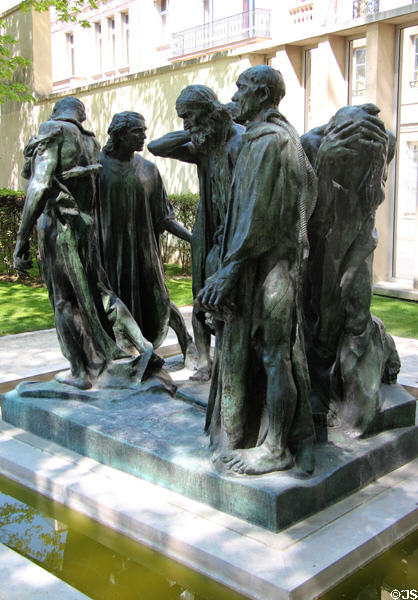 Monument to Burghers of Calais (1889) by Auguste Rodin with six leaders wearing robes of condemned at Rodin Museum. Paris, France.