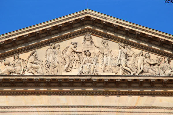 Bust of Louis XIV with Minerva, Muses & Victory pediment relief (1809) by François-Lemot on Colonnade of Louvre Palace. Paris, France.