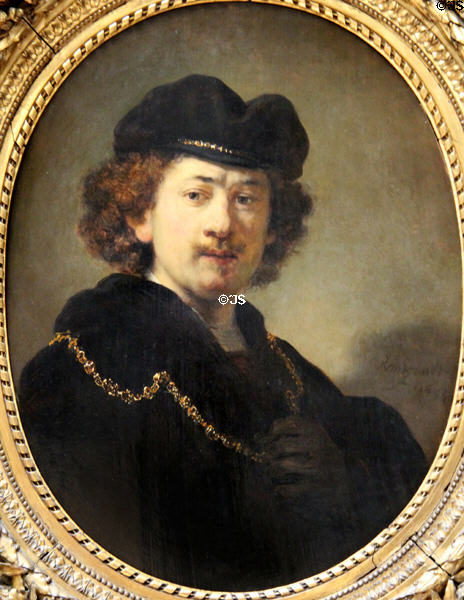 Self-portrait in toque & gold chain (1633) by Rembrandt at Louvre Museum. Paris, France.