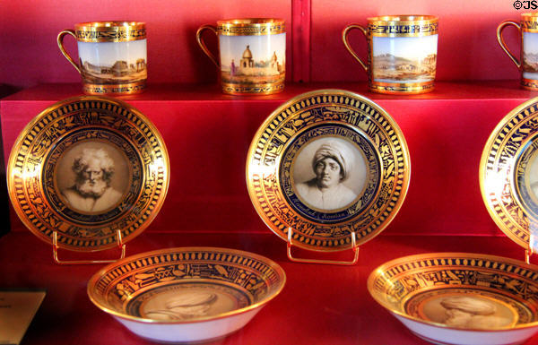 Cups & saucers with Egyptian themes (1810) by Sevres Manuf. at Louvre Museum. Paris, France.