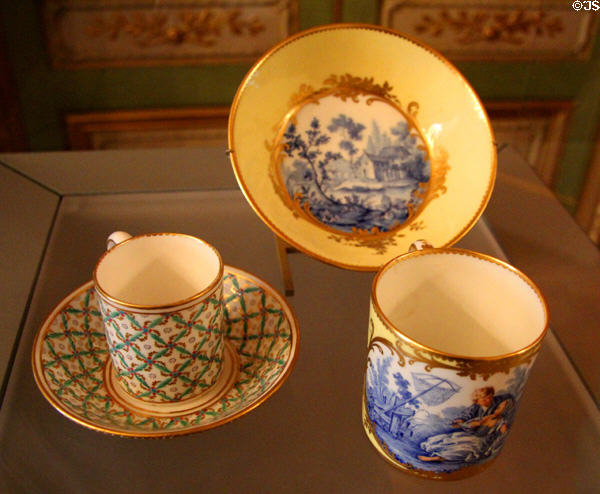 Painted porcelain cups & saucers (1770s) by Sevres Manuf. at Louvre Museum. Paris, France.