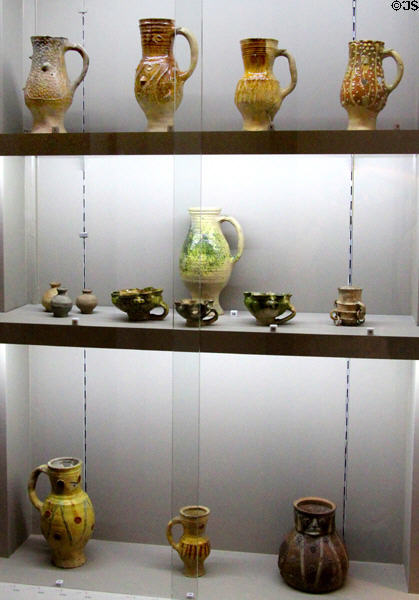 Showcase of early French pottery at Sèvres National Ceramic Museum. Paris, France.