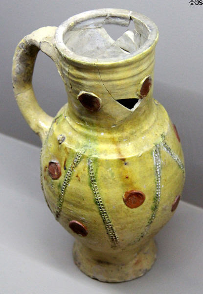 Glazed earthenware pitcher with circles (1300-50) from Paris at Sèvres National Ceramic Museum. Paris, France.
