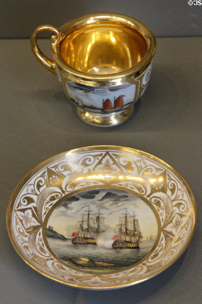 Davenport porcelain cup & saucer with British & American sailing ships exchanging canon fire (mid 19thC) at Arts et Metiers Museum. Paris, France.