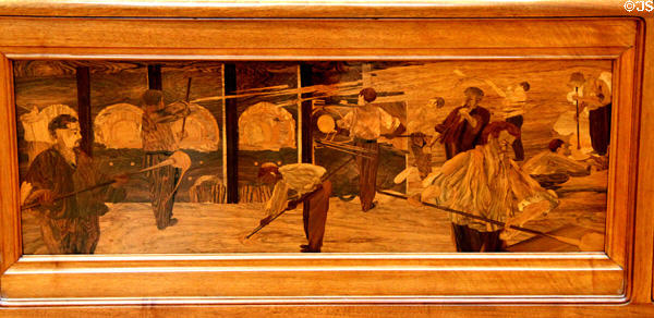 Inlaid scene of glass furnaces on Émile Gallé display case (1904) at Arts et Metiers Museum. Paris, France.