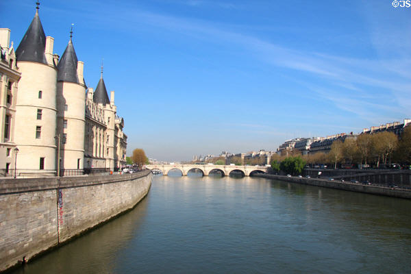 Conciergerie towers along the bank of Seine River. Paris, France.