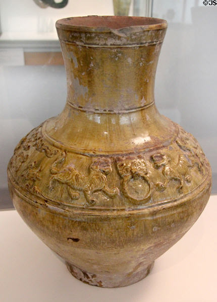 Chinese terra cotta vase for alcohol decorated with tigers (206 BCE - 220 CE - Han dynasty) at Guimet Museum. Paris, France.