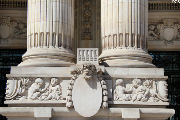 Frieze under columns of Grand Palais. Paris, France.