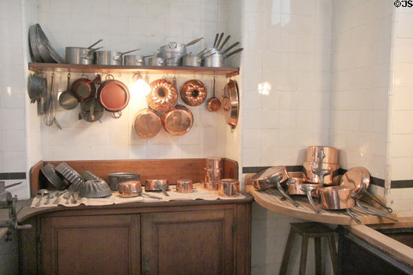 Molds & copper cooking pots in kitchen at Nissim de Camondo Museum. Paris, France.