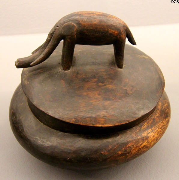 Lozi tribe carved wooden dish with elephant handle cover (19thC) from Zambia at Musée du quai Branly. Paris, France.