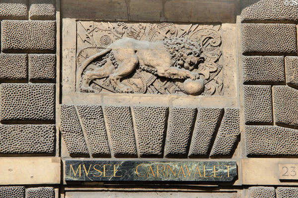 Lion carving by Goujon next to entrance at Carnavalet Museum. Paris, France.