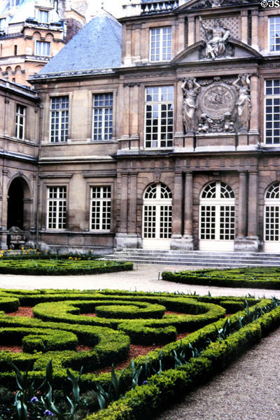 Courtyard with facing facade saved from historic building at Carnavalet Museum. Paris, France.