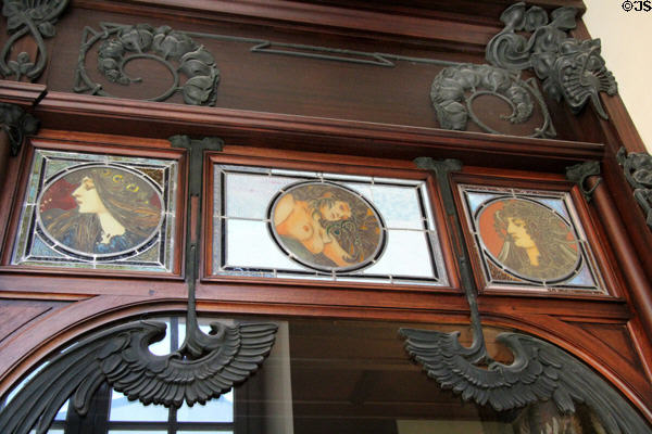 Art Nouveau style female portraits, wood framing & iron work (1901) designed by Alphonse Mucha on the storefront of Boutique Fouquet at Carnavalet Museum. Paris, France.