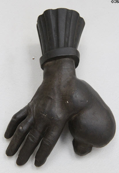 "To the Millionaire", symbol used by an itinerant bread & milk seller who had the idea to mold his deformed hand for his sign (19thC) at Carnavalet Museum. Paris, France.