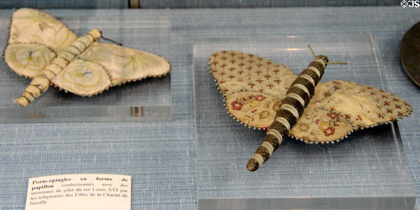 Pin cushions shaped like butterflies made from pieces of Louis XVI's vest by the Daughters of Charity of Neuilly at Carnavalet Museum. Paris, France.