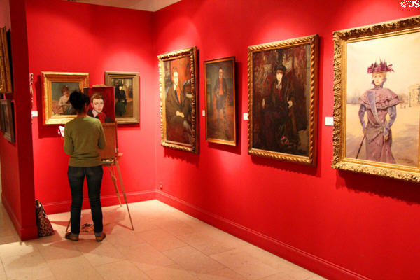 Art copyist in portrait gallery at Carnavalet Museum. Paris, France.