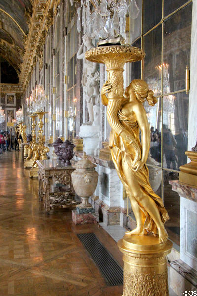 Candelabra stand & decorations in Hall of Mirrors at Versailles Palace. Versailles, France.