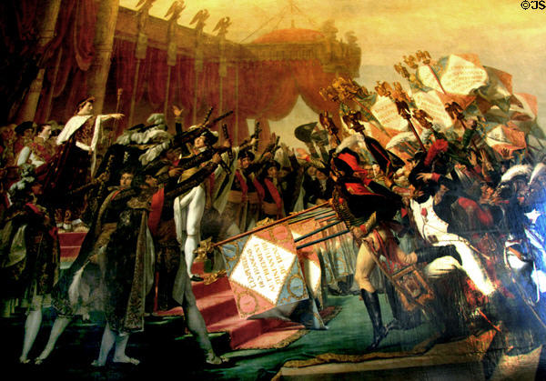 Napoleon Distributes Eagle Flag Standards to Army on Dec. 5, 1804 painting by Jacques Louis David in Grand Hall of Guards at Versailles Palace. Versailles, France.