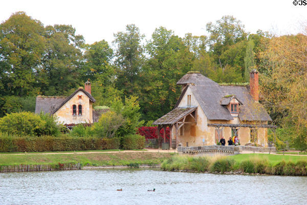 Rustic buildings of Marie Antoinette farm (Hameau de la Reine) where Queen played at being farmer. Versailles, France.