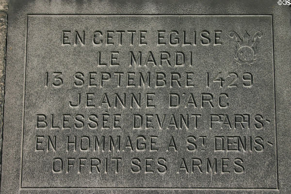 Plaque marking visit of Joan of Arc on Sept. 13, 1429, at St-Denis Basilica. St Denis, France.