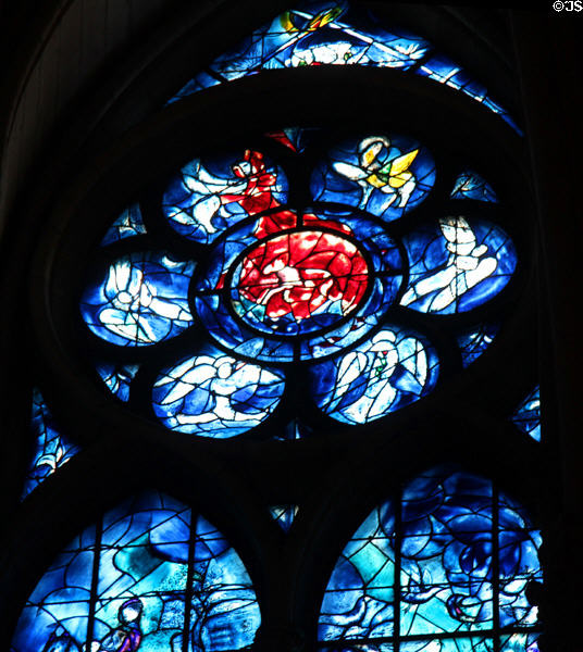 Vision of Apocalypse surrounded by Evangelists detail on Chagall stained glass window at Reims Cathedral. Reims, France.