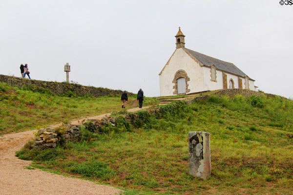 Pathway leading to chapel (rebuilt 1926) on top of Neolithic Saint-Michel Tumulus. Carnac, France.