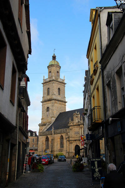 Narrow street of old Auray with view of St Gildas Church. Auray, France.