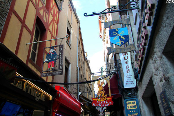 Some of many signs along Grande Rue. Mont-St-Michel, France.