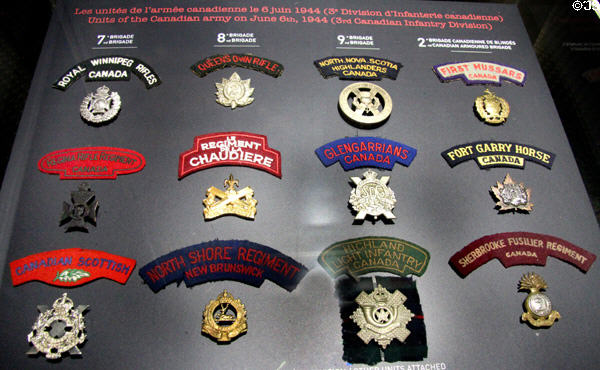 Shoulder patches & badges of Canadian units which participated on D-Day at Juno Beach Centre. Courseulles-sur-Mer, France.