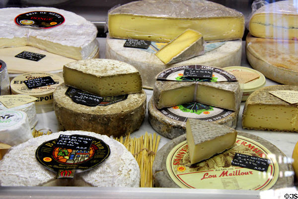 Cheese rounds at St Joan of Arc open-air marketplace. Rouen, France.