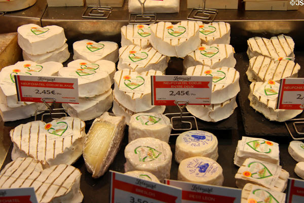 Normandy cheeses at St Joan of Arc open-air marketplace. Rouen, France.