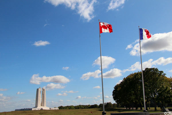 Canadian & French flags before Vimy Ridge Memorial. Vimy, France.