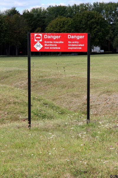 Warning signs marking field of unexploded munitions over a century after the battle at Vimy Ridge Memorial. Vimy, France.