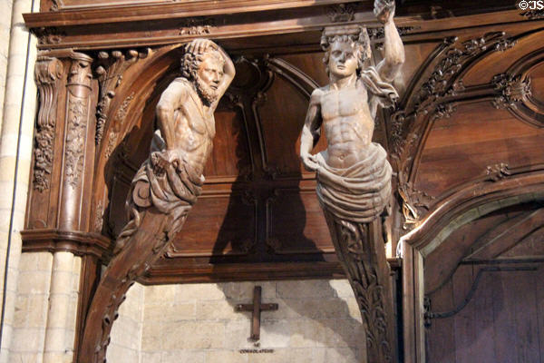 Detail of telamones supporting organs at St Maurice of Angers Cathedral. Angers, France.