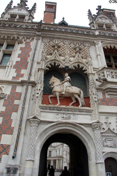 Portal to Blois Chateau with equestrian statue of king Louis XII. Blois, France.
