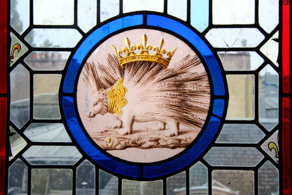 Stained glass panels with porcupine emblem of Louis XII in Estates General Room at Blois Chateau. Blois, France.