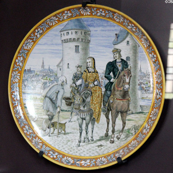 Louis XII & Anne of Brittany giving Alms painted on plate (1901) by Adrien Thibault of Blois faience at Blois Chateau. Blois, France.