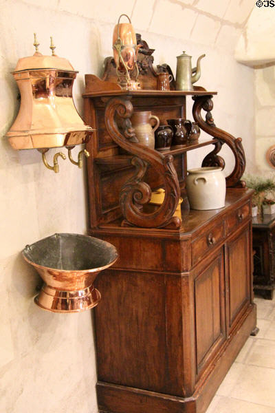 Copper water dispenser with sideboard in kitchen at Chenonceau Chateau. Chenonceau, France.