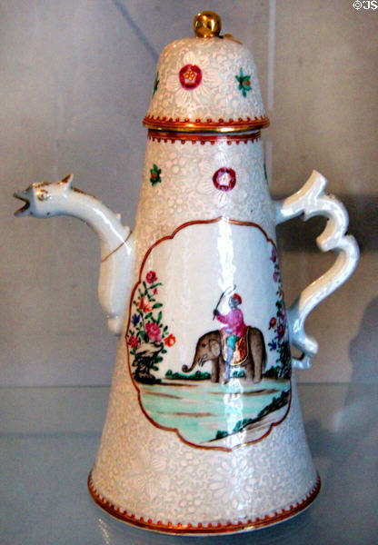Covered porcelain jug with Indian elephant decoration with bird-shaped spout (18thC) in shades of pink at Chateau D'Ussé. Ussé, France.