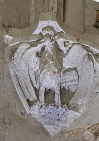 Eagle carved on column base around cloister at Fontevraud Abbey. Fontevraud, France.