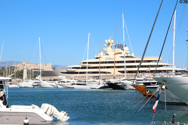 Harbor dominated by fort & mega-yacht. Antibes, France.