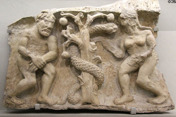 Temptation of Adam & Eve stone carving (12thC) from Cathedral of Notre-Dame & St Castor at Musée de la Romanité. Nimes, France.